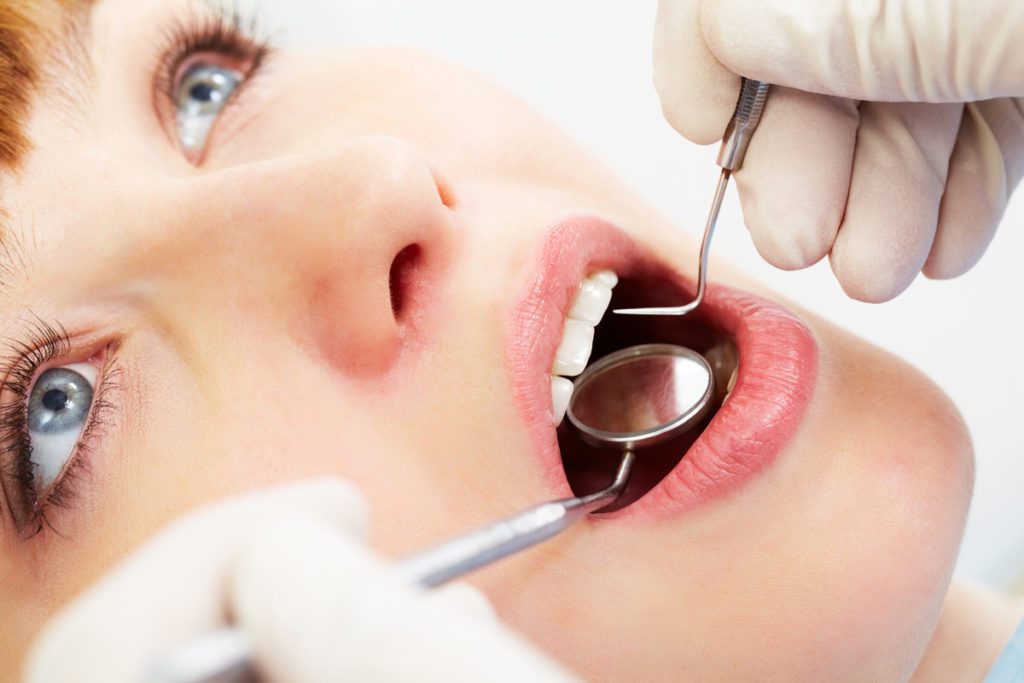 Examining mouth oral cancer screenings anderson